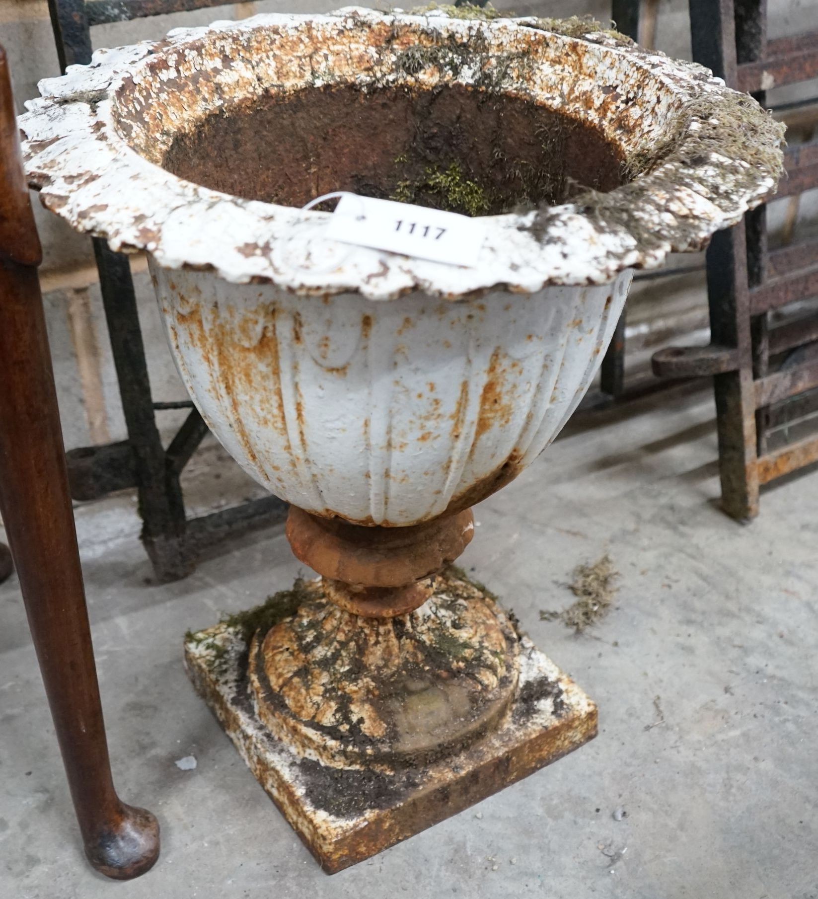 A Victorian painted white cast iron campana garden urn, diameter 42cm, height 49cm